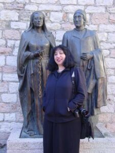 Aviva with a statue outside Chiesa Nuova Aviva with a statue outside the church