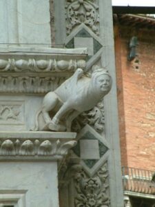 A strange creature on the facade of the Duomo
