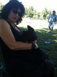 Aviva and Jett sitting in the park