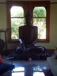 A large Buddha dominated one living room