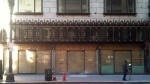 A boarded up building on 4th Street