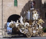 A parade object sitting in a parking lot