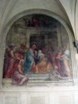 Two of the many frescoes on the walls of the square