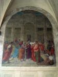 Two of the many frescoes on the walls of the square