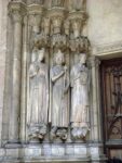 Statues on both side of the entry doors