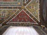 Grotesques that decorate the ceiling