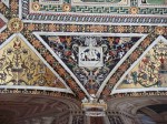 Grotesques that decorate the ceiling