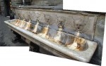 A detail of the trough showing the cherubs