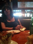 Aviva talking with me at the table