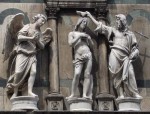 a closeup of the statues on the Bapistry