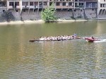 A skuling team practicing on the Arno near the Ponte Vecchio