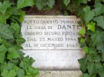 The sign on the mound behind the tomb