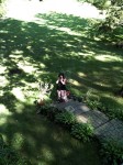 Aviva taking a picture of me in the backyard of a friend's home